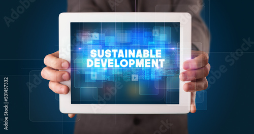 Wallpaper Mural Person holding tablet, technology concept Torontodigital.ca