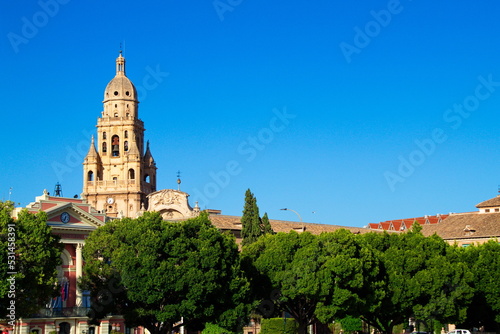Nice panorama of the tower of the Cathedral of Murcia and the facade of the Town Hall on a sunny day