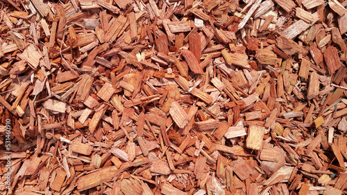 Natural background of red mulch, close up photo