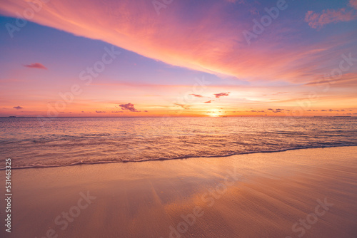 Majestic closeup view of calm sea water waves with orange sunrise sunset sunlight. Tropical island beach landscape, exotic shore coast. Summer vacation, holiday amazing nature scenic. Relax paradise © icemanphotos