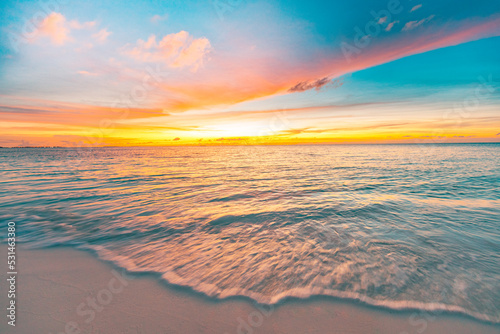 Majestic closeup view of calm sea water waves with orange sunrise sunset sunlight. Tropical island beach landscape, exotic shore coast. Summer vacation, holiday amazing nature scenic. Relax paradise