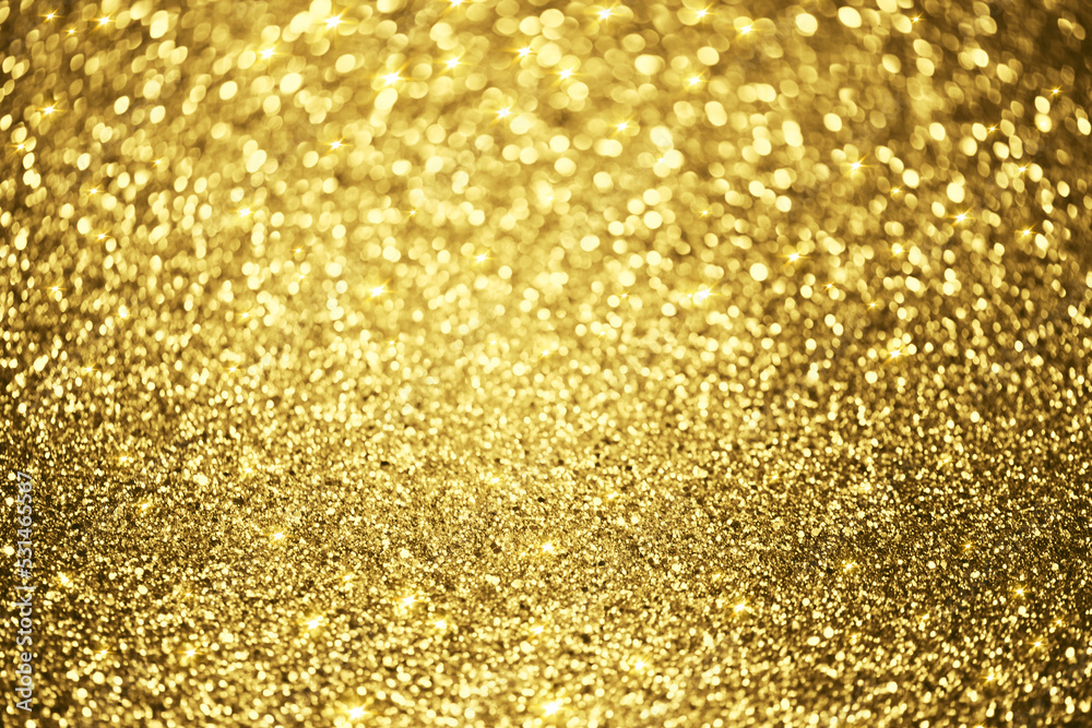 Golden glitter bokeh lighting texture Blurred abstract background for birthday, anniversary, wedding, new year eve or Christmas