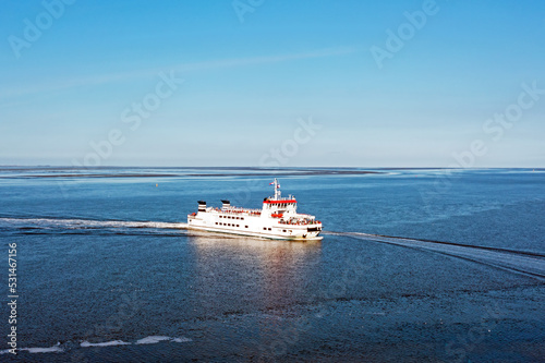 Aerial from the ferry from Schiermonnikoog at the Wadden Sea in the Netherlands photo