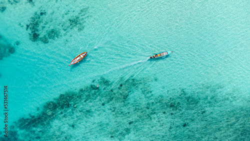 aerial view of long tail boat. Long tail boat sailing in the beautiful sea.