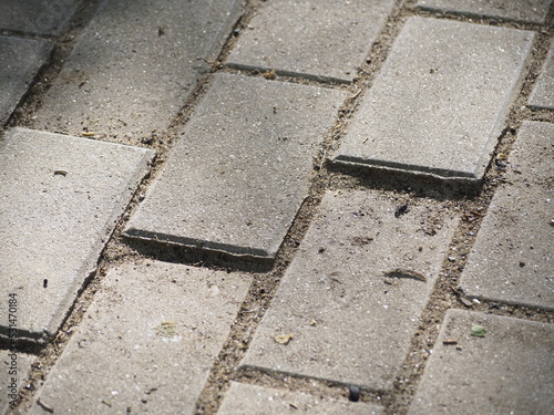 uneven sidewalk tiles. Potholes, insecurity and risk, hd image photo