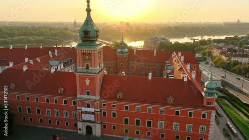 Warsaw old town at sunrise, aerial view of medieval royal castle in the capital of Poland with the clock tower, unesco tourist attraction in Poland photo