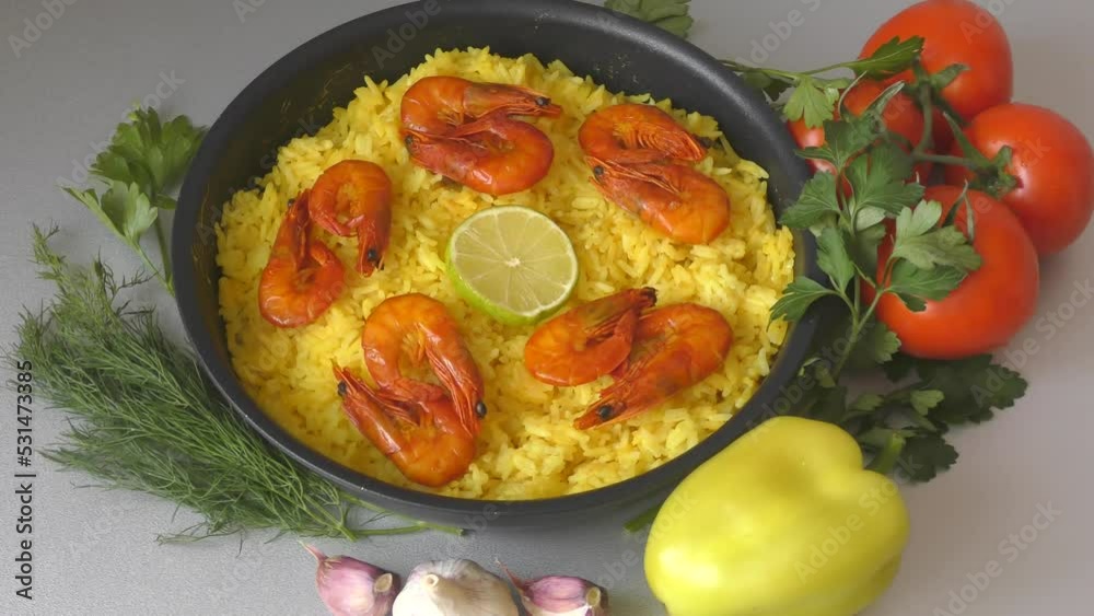 Paella with shrimp is a national Spanish and Valencian dish made of