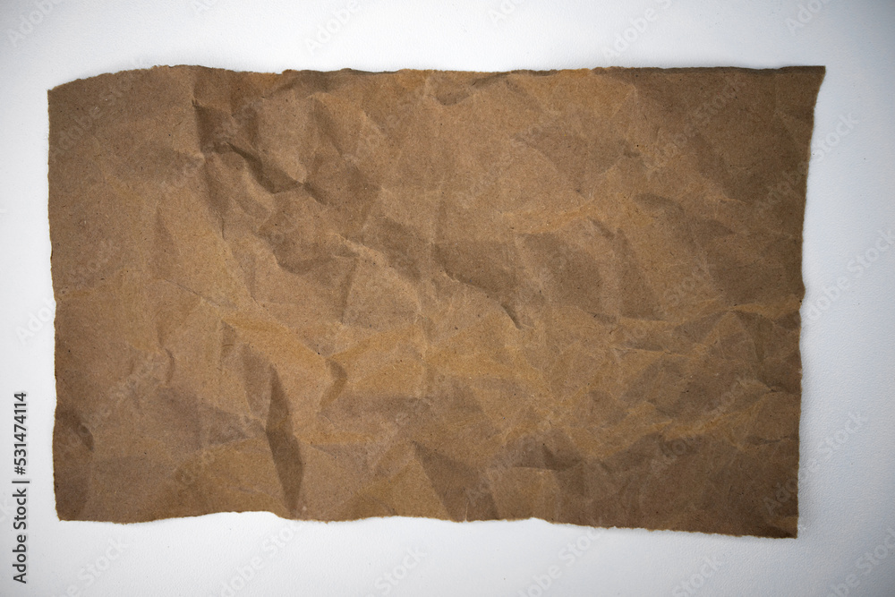 A crumpled sheet of old paper on a white isolate. A clean note on a white background. A crumpled sheet of old paper on a white isolate. A clean note on a white background.
