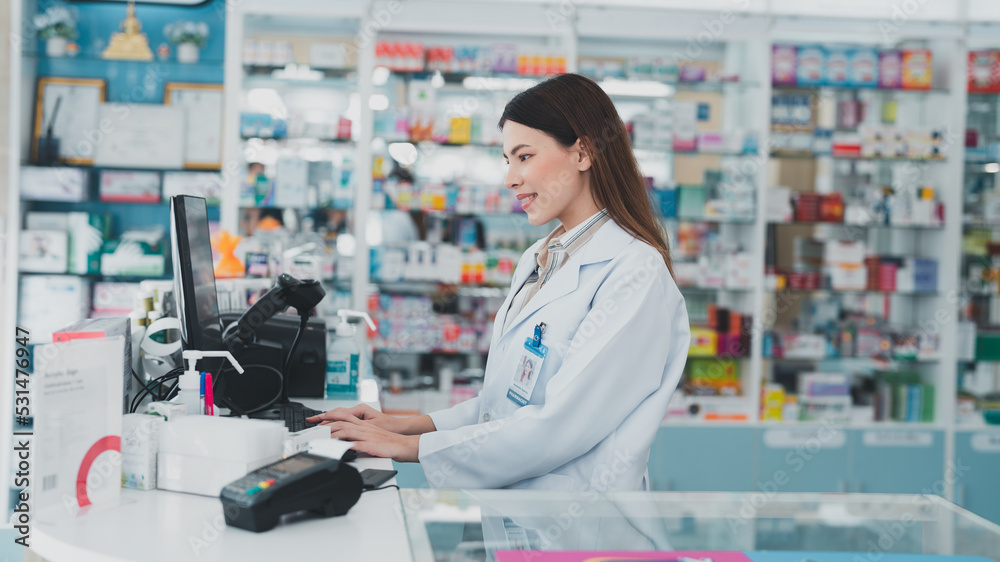 female pharmacist at drugstore.Doctors specializing in medicines.Medical product inventory.female doctor holding a prescription.Health care pharmacists work at the hospital.