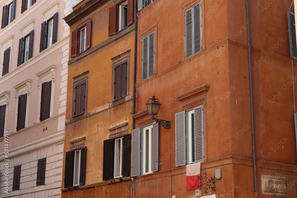 Via dei Banchi Vecchi Street Traditional Brown House Facades in Rome, Italy