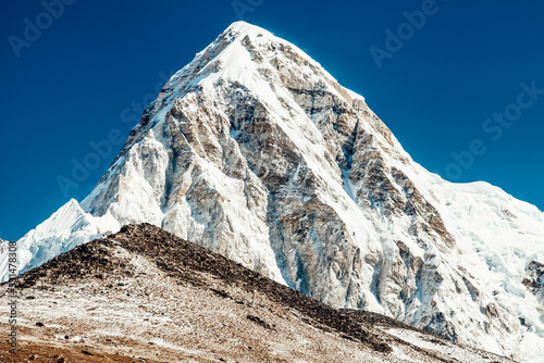 Pumori and Kala Patthar mountain summits on the Everest Base Camp trek in Himalayas. Nepal. photo
