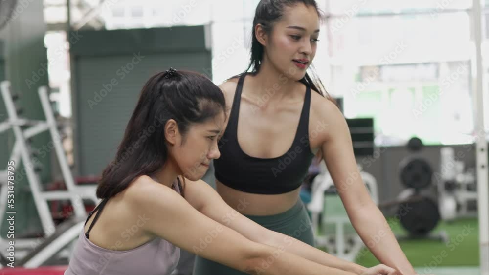 Beautiful women working out in gym together, Healthcare motivation concept