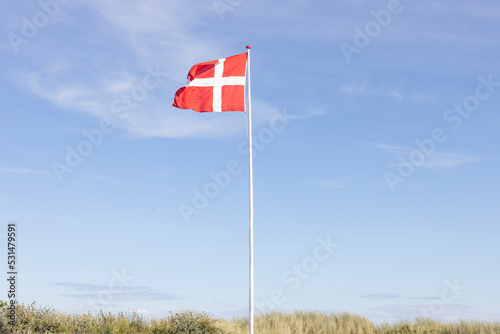 Dannebrog is Denmark's flag which, according to legend, fell from the sky during one of Valdemar Seier's battles in Estonia.Scandinavia,Europe,Skagen photo