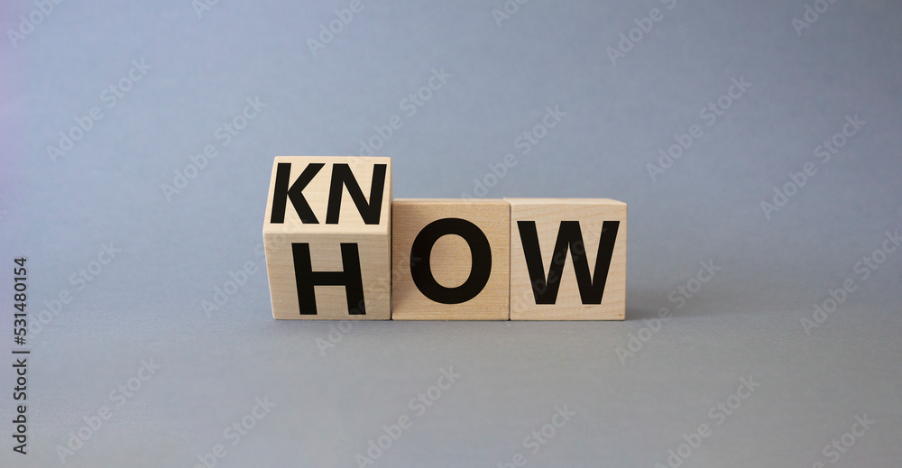 Know how symbol. Turned wooden cubes with words How and Know. Beautiful grey background. Business and Know how concept. Copy space. Know how symbol. Turned wooden cubes with words How and Know. Beautiful grey background. Business and Know how concept. Copy space.