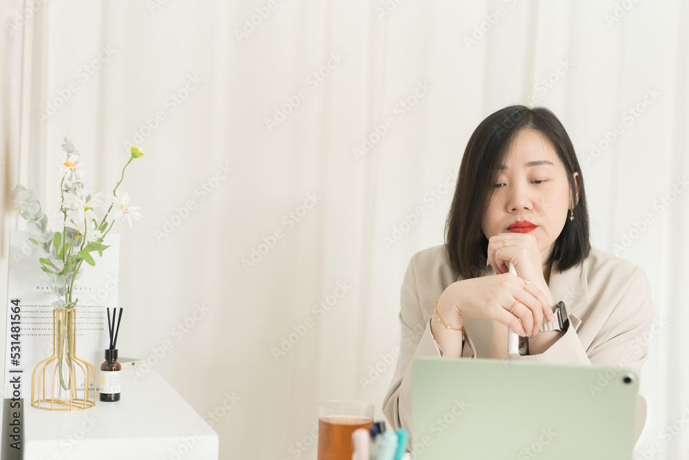asian business and writer woman during think new her idea and meeting online asian business and writer woman during think new her idea and meeting online