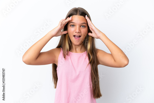 Little caucasian girl isolated on white background with surprise expression