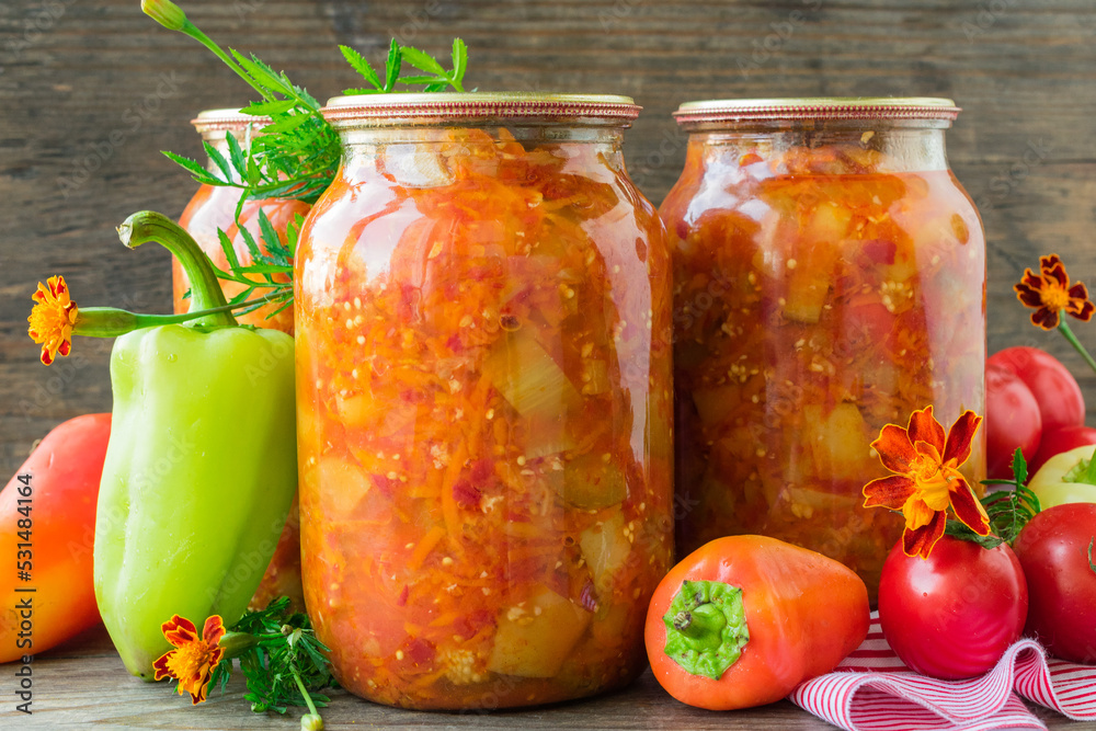 Canned eggplant and bell peppers in tomato sauce. Eggplant and pepper salad in tomato sauce Canned eggplant and bell peppers in tomato sauce. Eggplant and pepper salad in tomato sauce