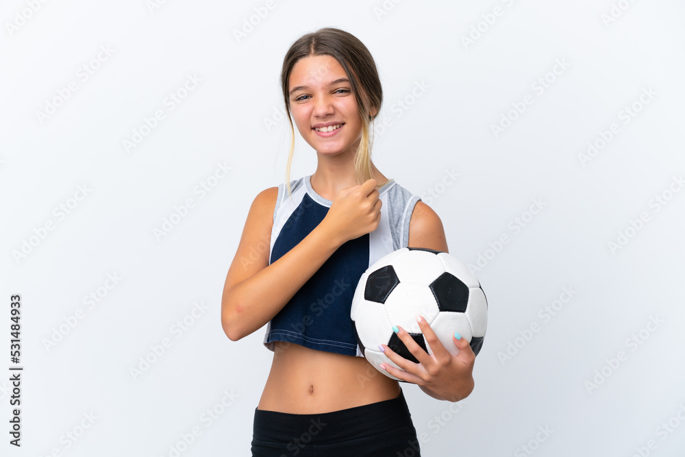 Little caucasian girl playing football isolated on white background celebrating a victory