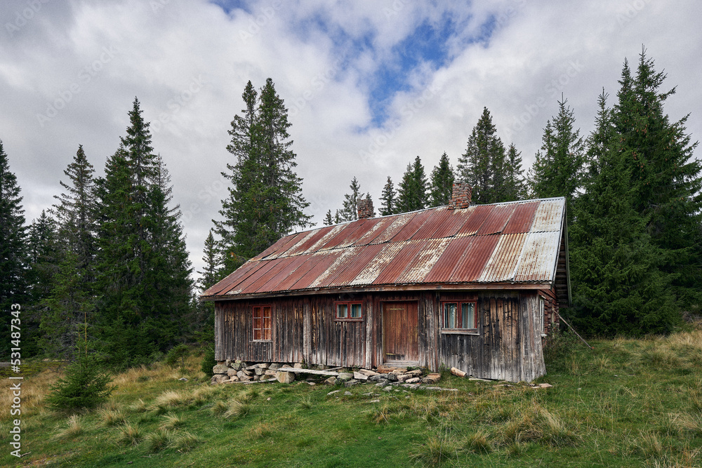 The farmhouse of Kolbuseter summer farm, a nice stop by the Totenåsstien hiking trail of the Totenåsen Hills, Norway. The farmhouse of Kolbuseter summer farm, a nice stop by the Totenåsstien hiking trail of the Totenåsen Hills, Norway.