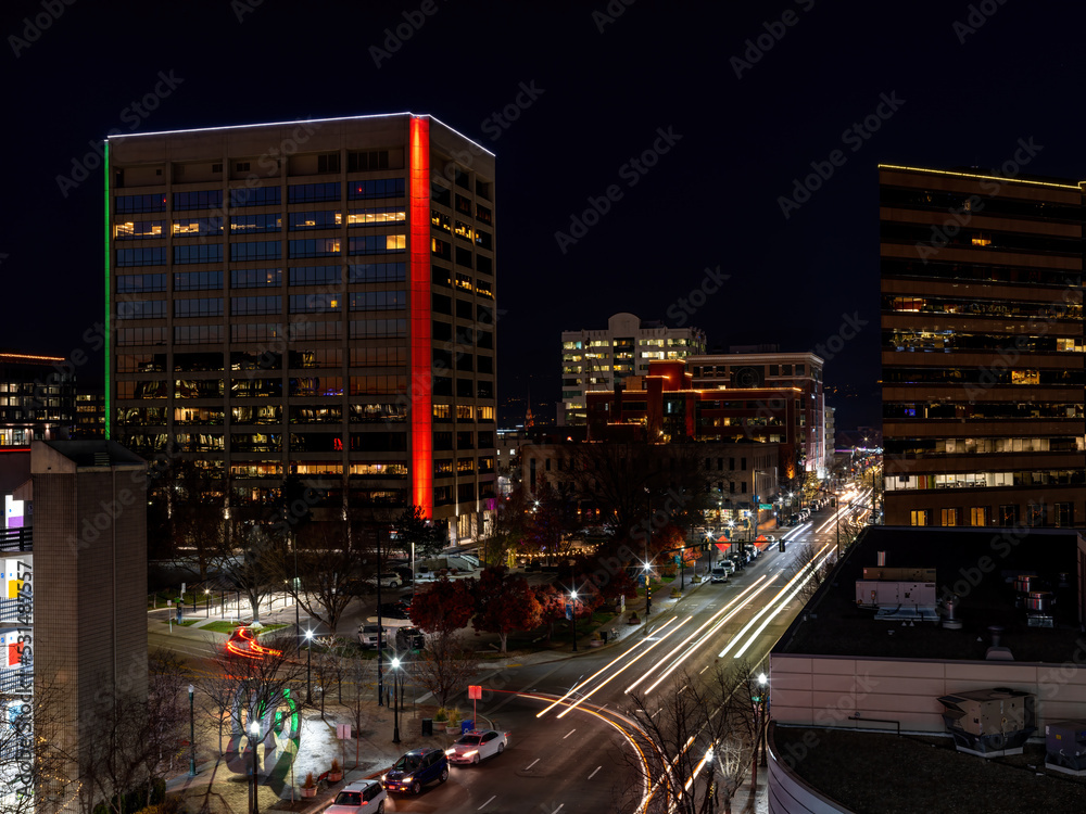Obraz premium Downtown Boise at night with streaking car lights
