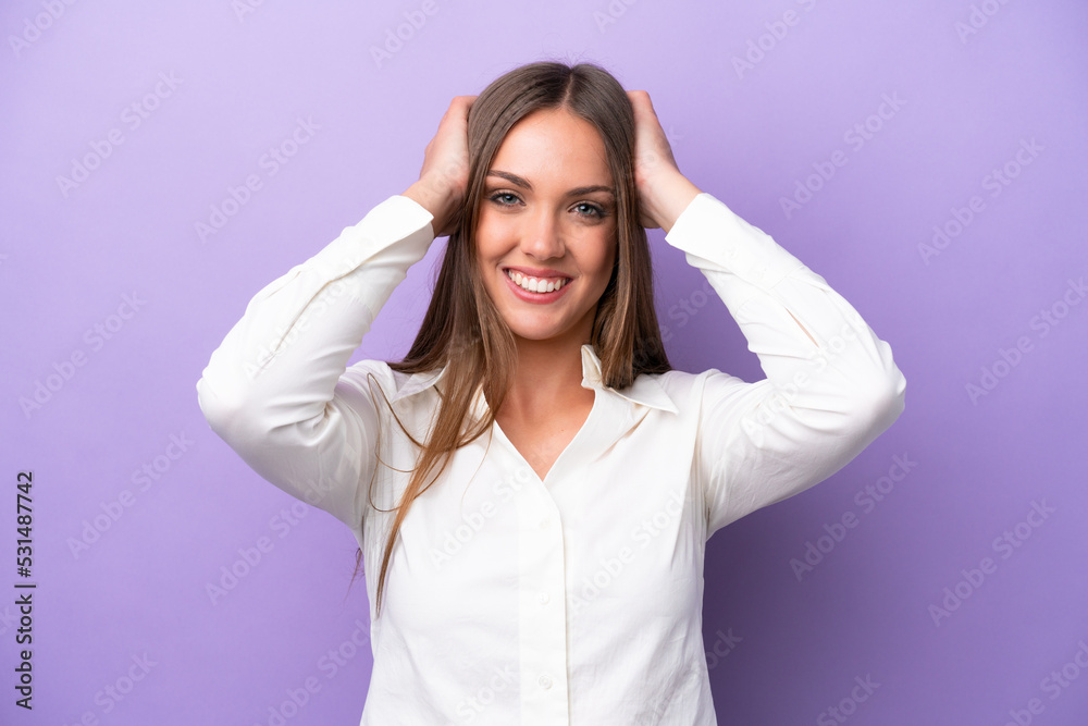 Young caucasian woman isolated on purple background laughing