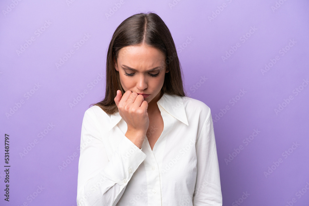 Young caucasian woman isolated on purple background having doubts Young caucasian woman isolated on purple background having doubts