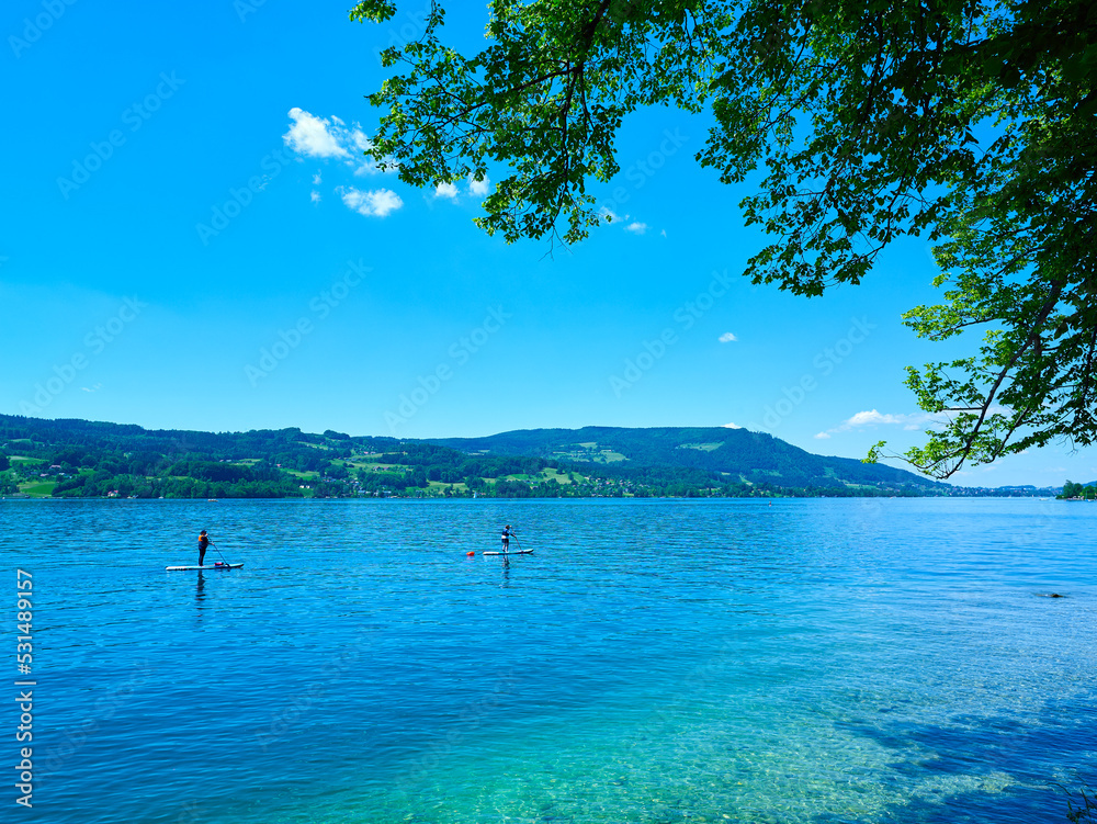 SUP surfing on lake Attersee. SUP surfing on lake Attersee.