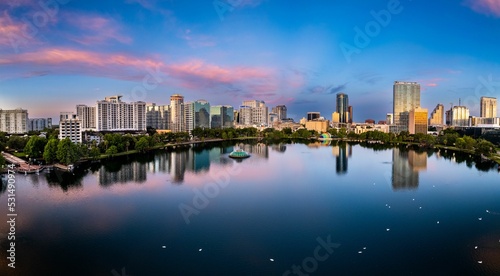 Aerial view of lake Eola and the Orlando city skyline at sunrise photo