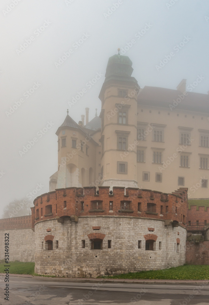 Wawel castle in the morning fog, Krakow, Poland