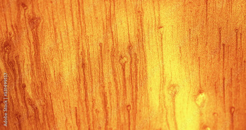 Fototapeta premium Glitter fluid background. Color sand texture. Shimmering sparkles drip. Orange yellow shiny particles abstract copy space wallpaper.