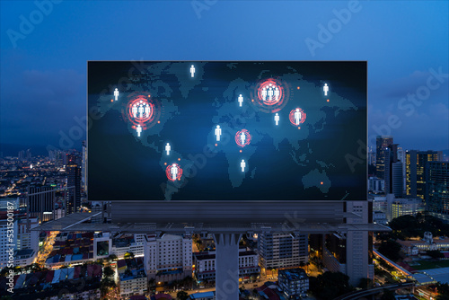 Hologram of Earth planet map on billboard over night panoramic cityscape of Kuala Lumpur, Malaysia, Asia. The concept of international companies in KL. Globe