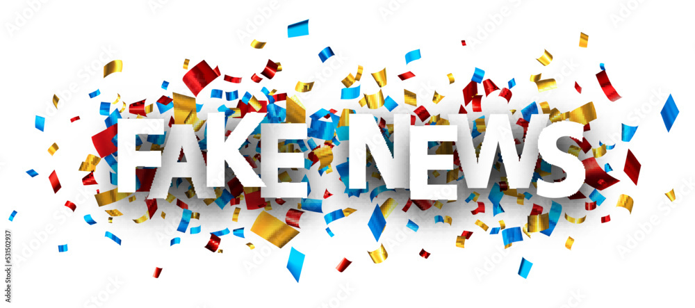 Fake news sign over colorful cut ribbon confetti background.
