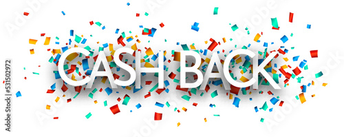 Cash back sign on cut ribbon confetti background.