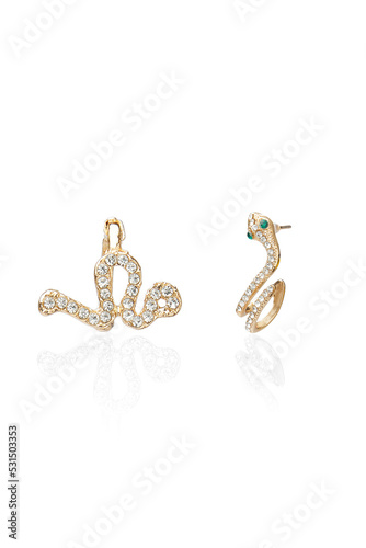 Close-up shot of two asymmetrical golden snake ear cuffs. A rhinestone snake cuff set is isolated on a white background. Front view.