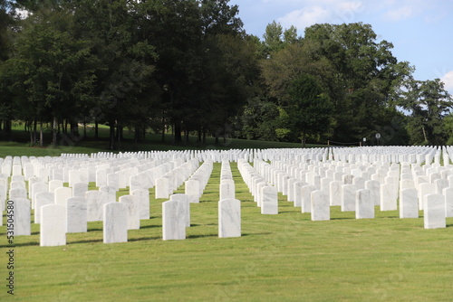 National Cemetery, with markers, head stones , and flags