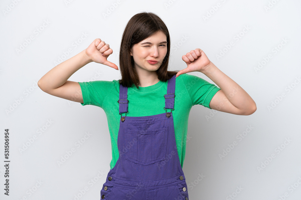 Young Russian woman isolated on blue background proud and self-satisfied Young Russian woman isolated on blue background proud and self-satisfied