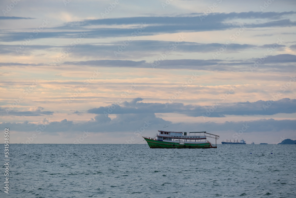 Ship in sea under sky