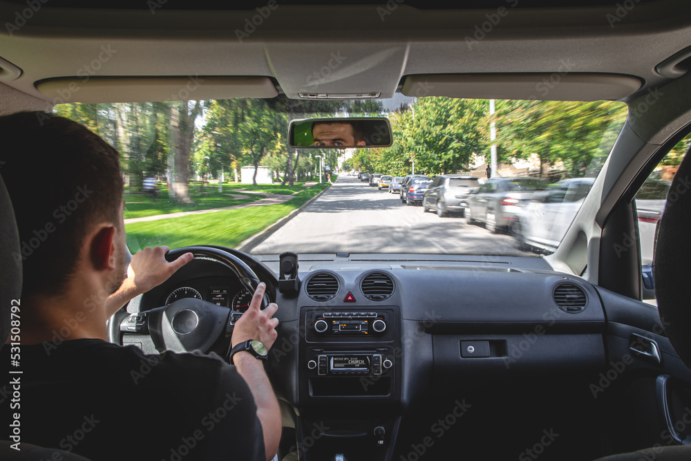 Hands on the wheel when driving at high speed from inside the car. Hands on the wheel when driving at high speed from inside the car.