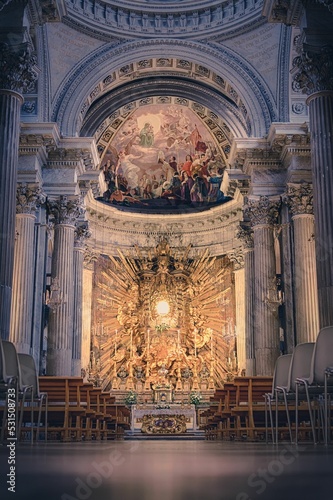 Vertical shot of Santa Maria in Campitelli church's main altar and gilded glory. Rome, Italy. photo