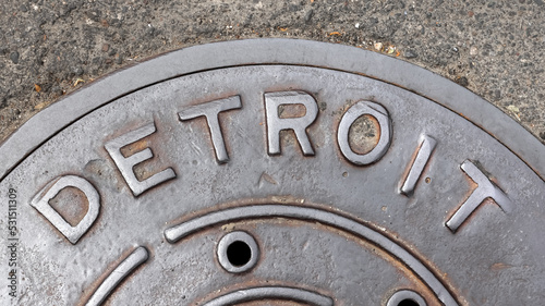 Detroit city sign on old Man hole cover