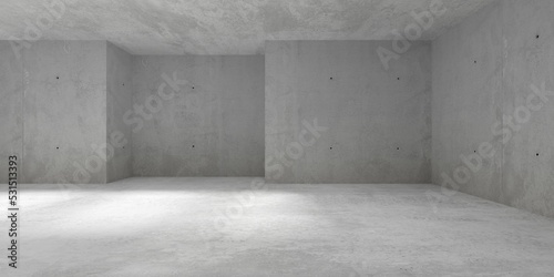 Abstract empty, modern concrete room with wide niche on the back wall and rough floor - industrial interior background template photo