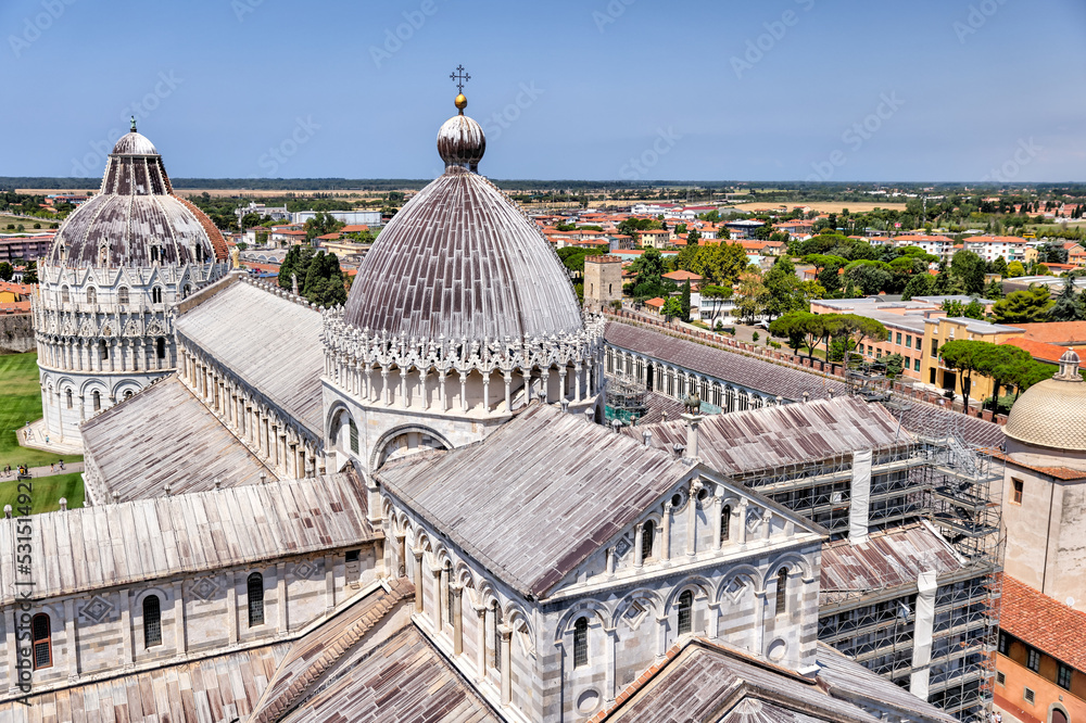 Pisa, Italy - July 24, 2022: Tourists taking in the sights at the leaning tower of Pisa
