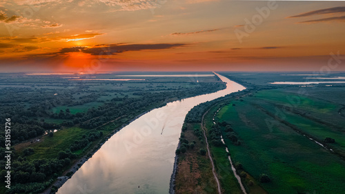 Aerial photography shot over Danube's delta, near Sulina city, Romania. Photography was taken from a drone at a higher altitude at sunrise.