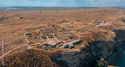 Aerial view of the ruins of Argamum fortress located in Tulcea county, Romania by the Lake Razim. Photography was taken from a drone in mid day, in a sunny weather, summer time. photo