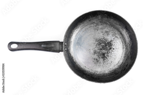 Old dirty and scratched textured frying pan isolated on white with clipping path
