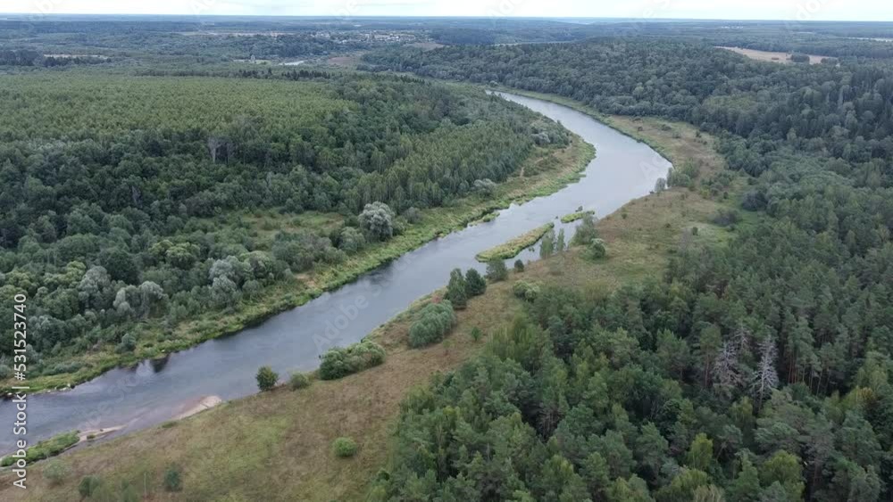 Flying over river on cloudy day. Drone video. Flying over river on cloudy day. Drone video.