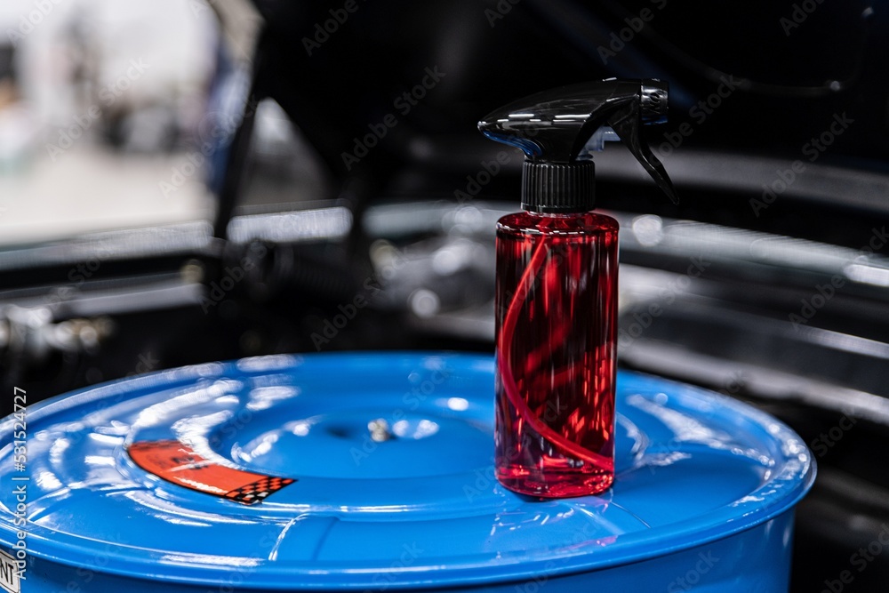 Detergent to clean the engine on the blue engine air filter housing. Car care