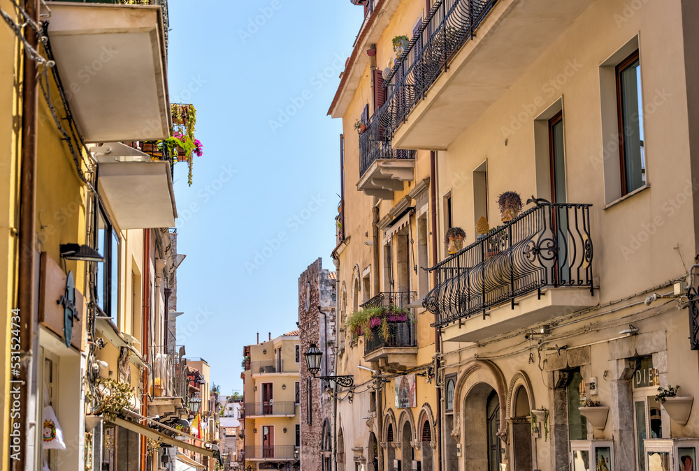 Taormina, Italy - July 22, 2022: Scenic streets and sidewalks in Taormina, Sicily
