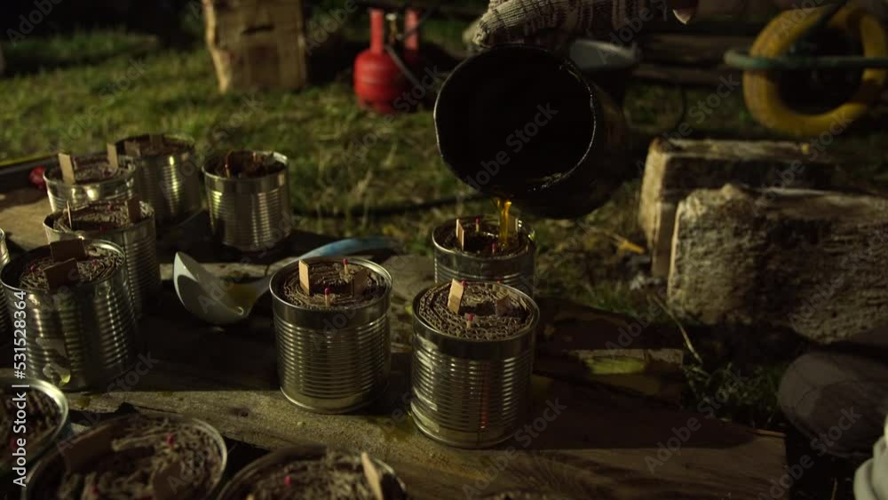 Volunteers help ukrainian soldiers. 4k video of team of people making special handmade trench warming candles for winter season to warm troops during war of Russia against Ukraine 2022, 2023 Volunteers help ukrainian soldiers. 4k video of team of people making special handmade trench warming candles for winter season to warm troops during war of Russia against Ukraine 2022, 2023