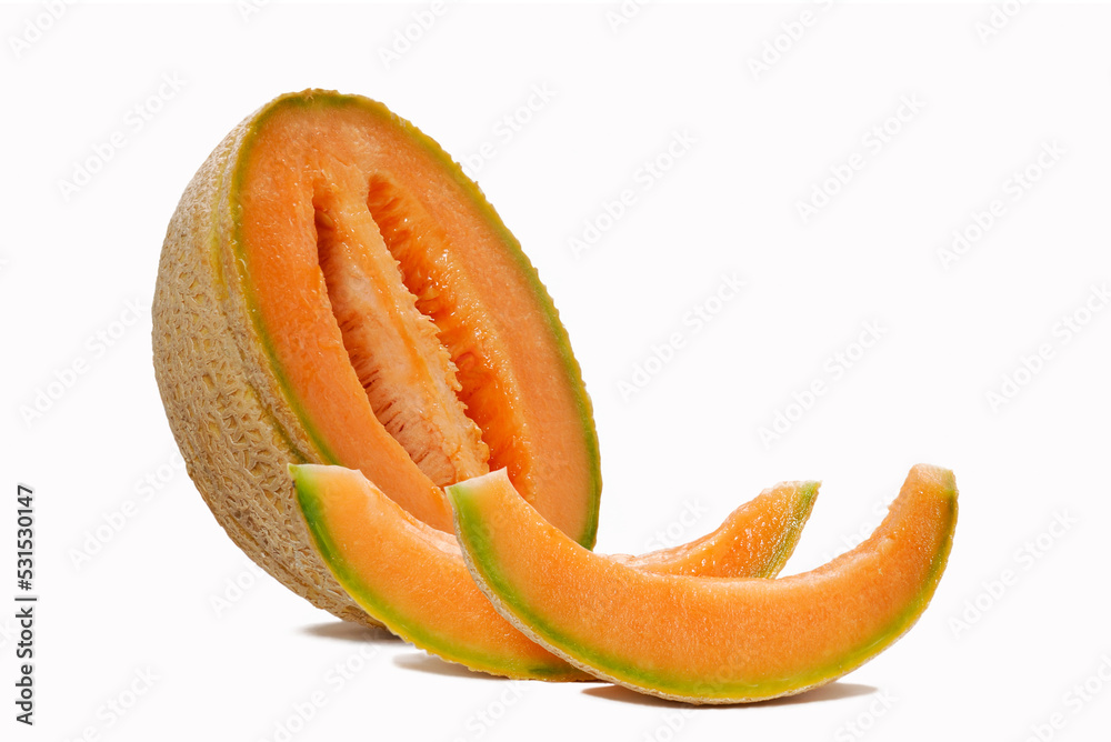 Halved melon and slices pieces on white backhround. Halved melon and slices pieces on white backhround.